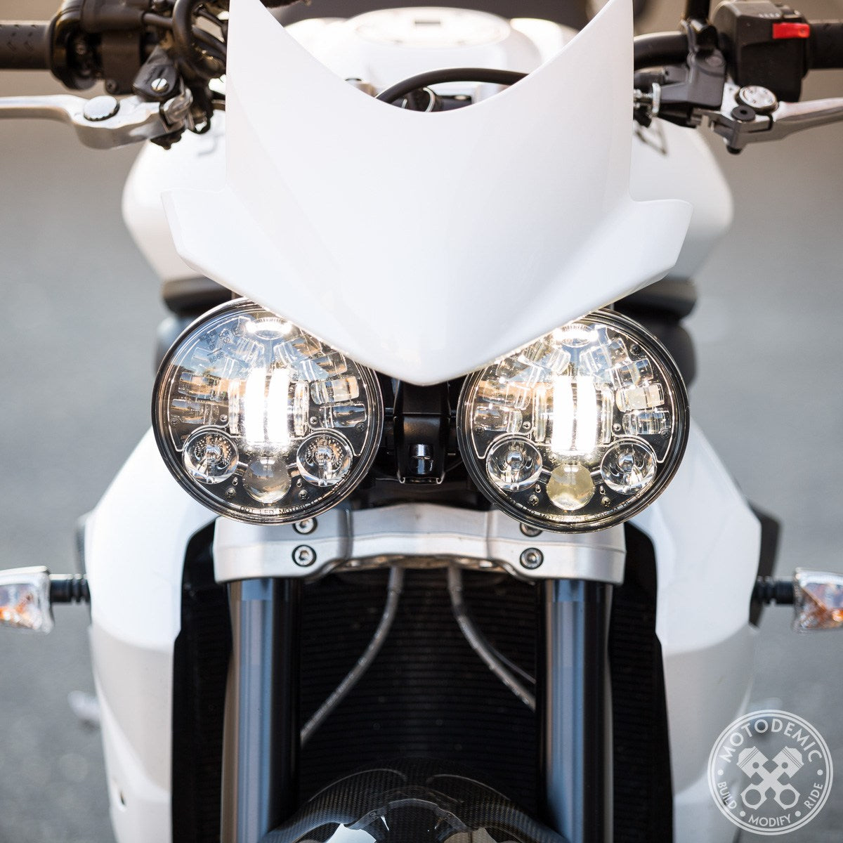 Motodemic Dual Adaptive LED Headlight Conversion Kit for the 2012-2016 Triumph Street Triple and 2011-2015 Speed Triple