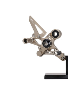AEM FACTORY - DUCATI MONSTER 696  796 & 1100 ADJUSTABLE BILLET REARSETS  WITH COLORED ECCENTRIC