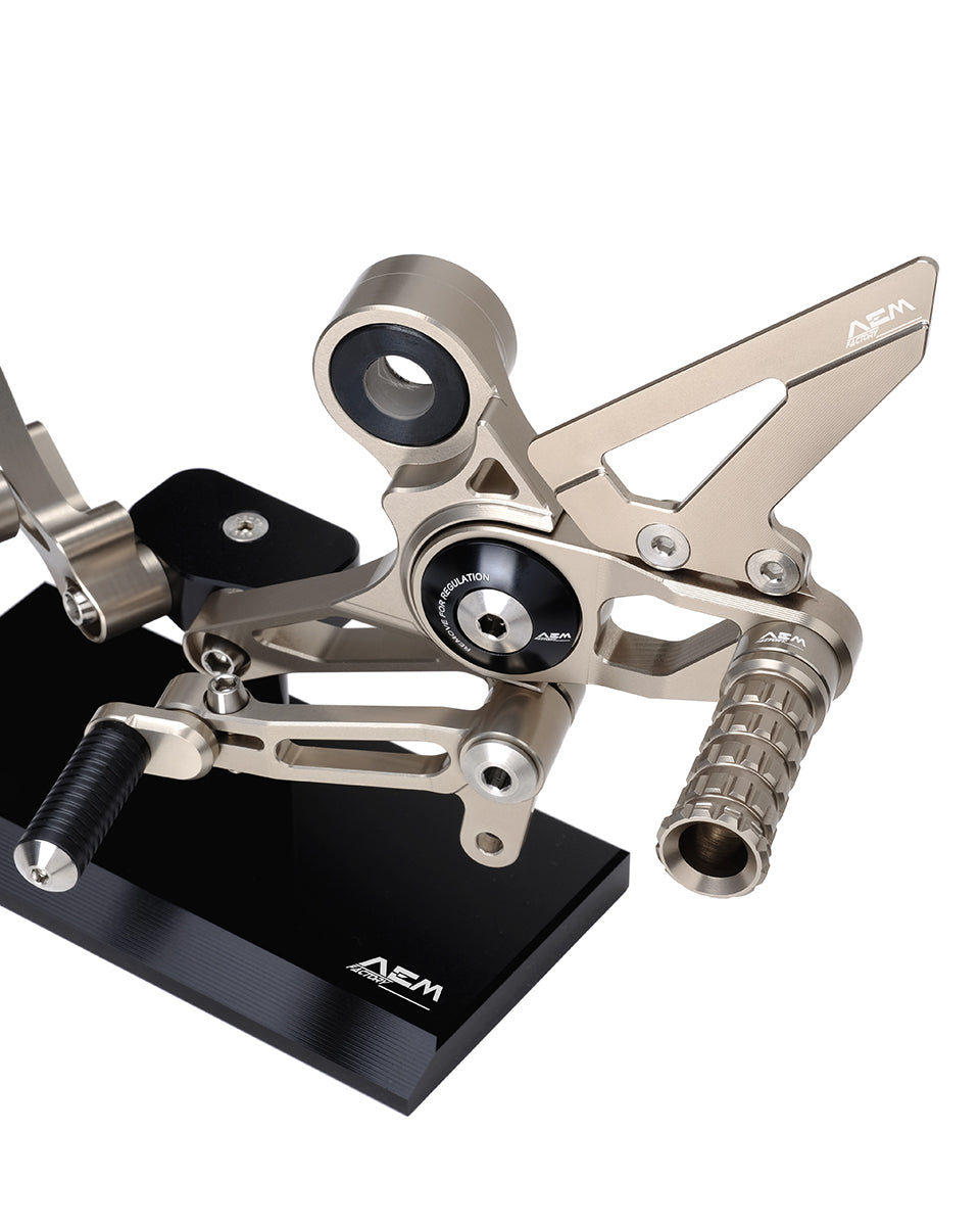 AEM FACTORY - DUCATI MONSTER 696  796 & 1100 ADJUSTABLE BILLET REARSETS  WITH COLORED ECCENTRIC