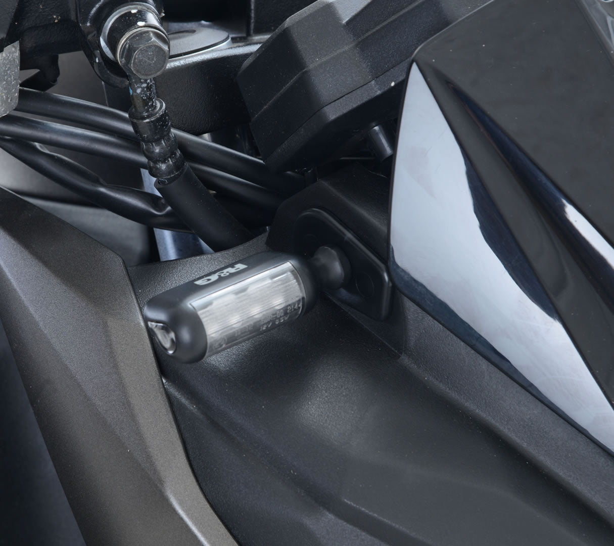 R&G Racing Front Indicator Adapter Kit for the Kawasaki Ninja 650/Z650/Z1000R '17-18, Versys 650 '15-16, Z1000 '14-18, Z300 '15-18 & Z125 Pro '16-18 models