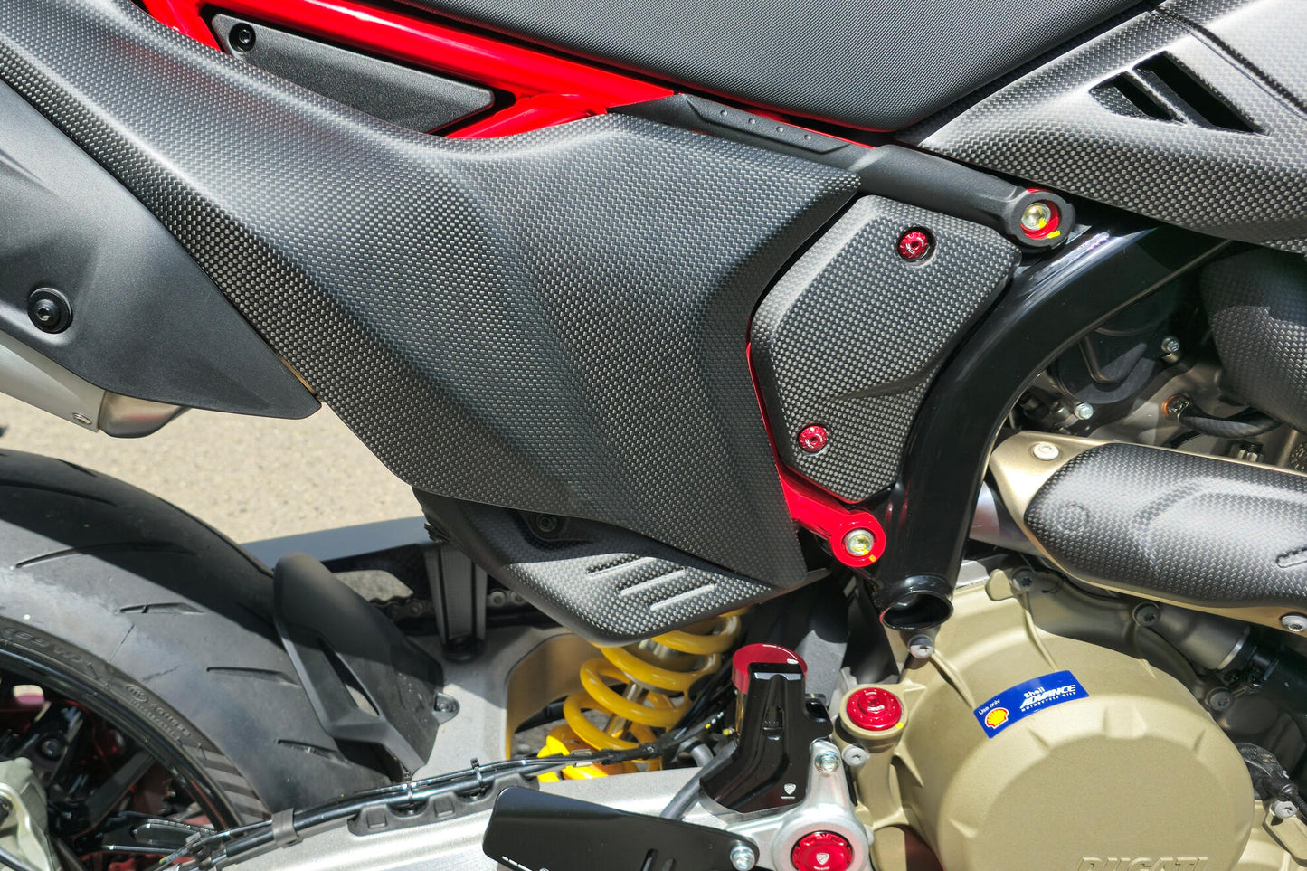 CNC Racing Carbon Fiber Rear Exhaust Guard for the Ducati Hypermotard 698 Mono